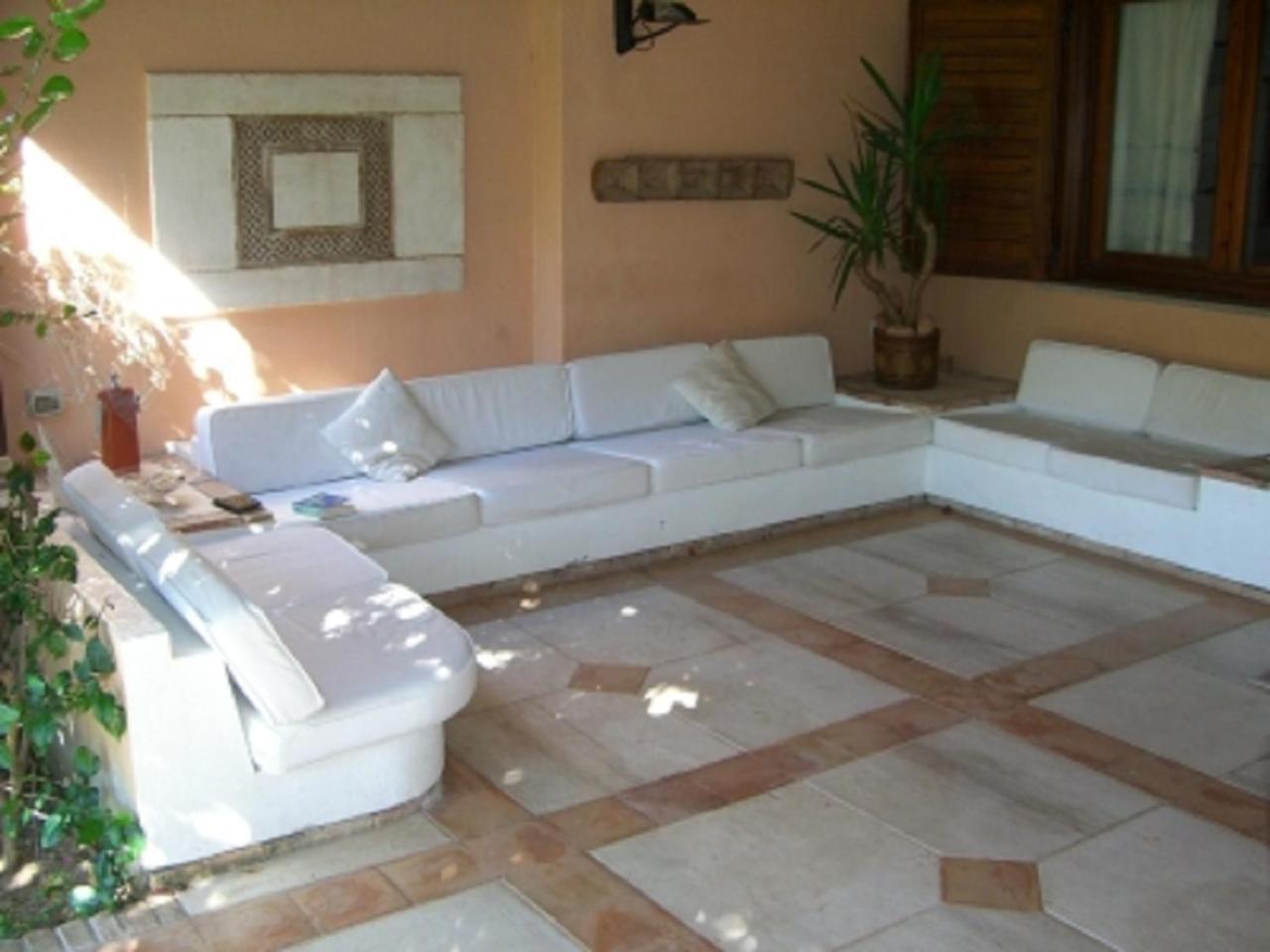 Casa Vacanza Porto Luna 68 Виласимиус Екстериор снимка